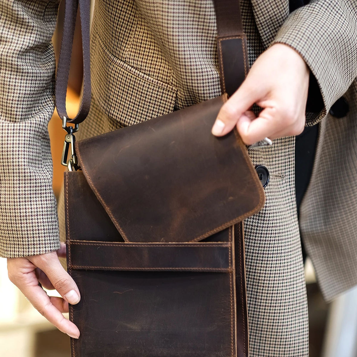Avenor handcrafted brown Crazy Horse leather slim vertical crossbody messenger bag front view - Yubello