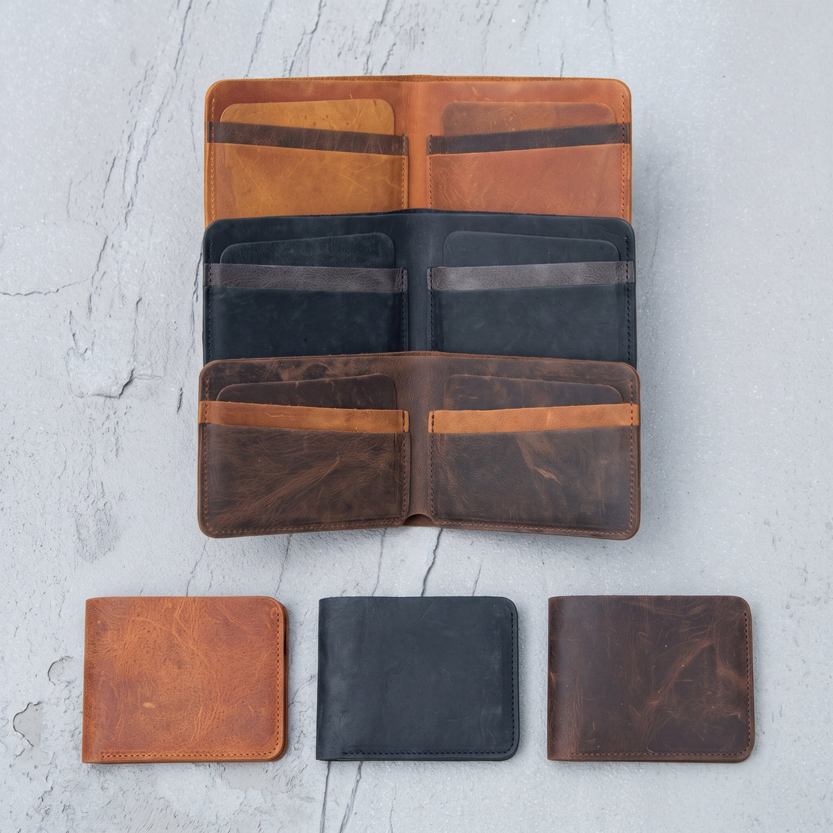 Sterling handcrafted slim leather bifold wallets open and closed in tan black and dark brown - Yubello