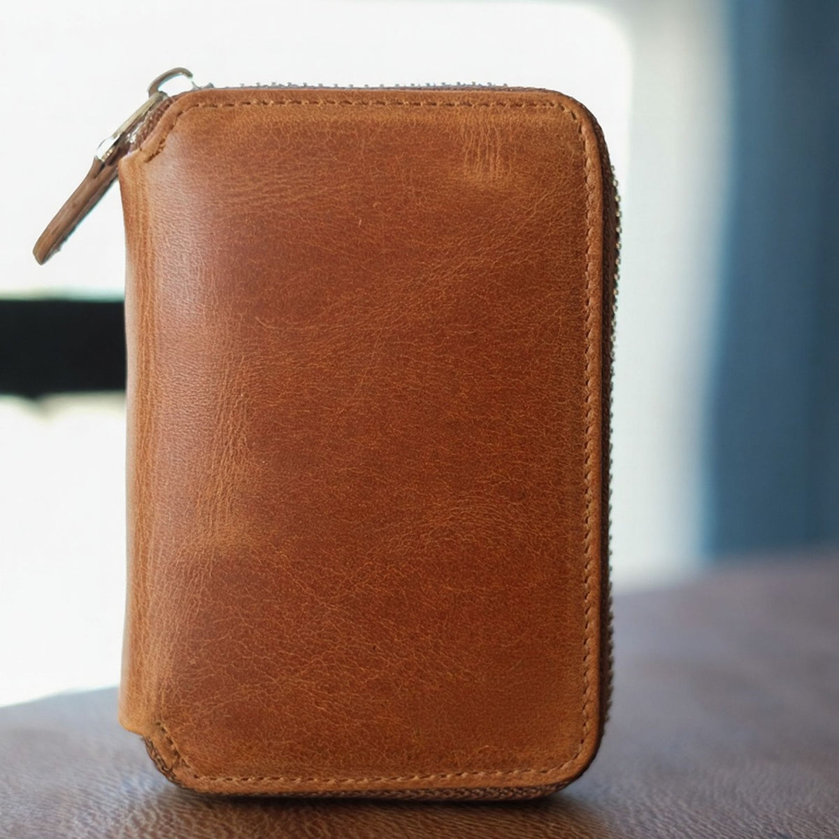 Vanguard handcrafted tan brown Crazy Horse leather zip-around wallet front view - Yubello