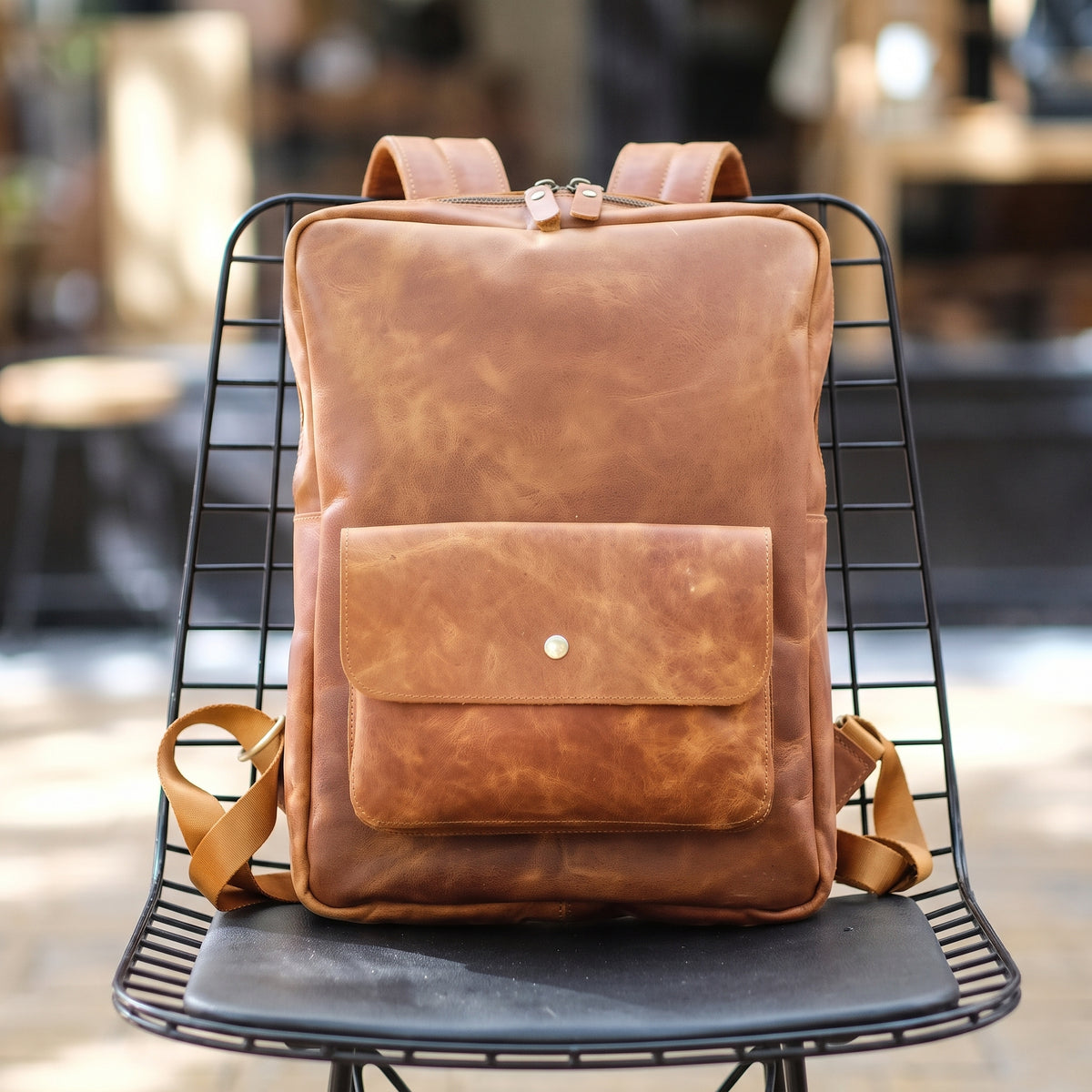 Arden handcrafted tan leather backpack laptop commuter daypack front view - Yubello