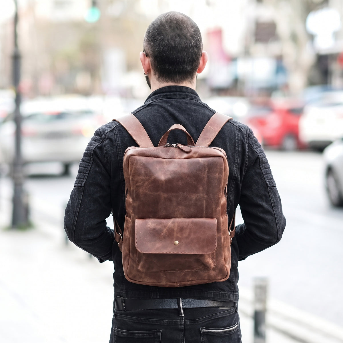 Arden handcrafted brown leather backpack on model commuter street style - Yubello