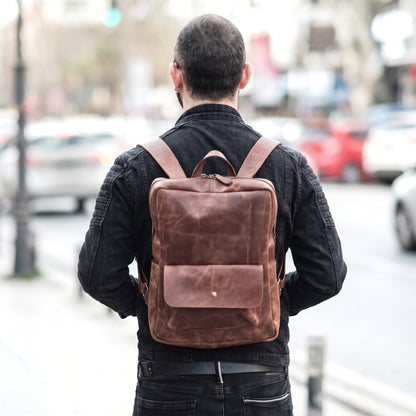 Arden handcrafted brown leather backpack on model commuter street style - Yubello