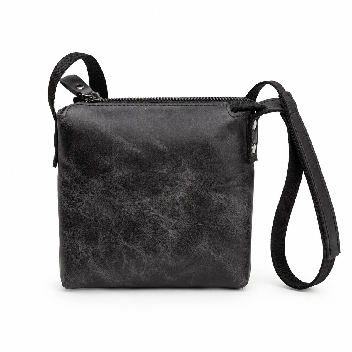 Corven handcrafted black Crazy Horse leather vertical crossbody messenger bag front view - Yubello