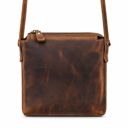 Corven handcrafted brown Crazy Horse leather vertical crossbody messenger bag front view - Yubello