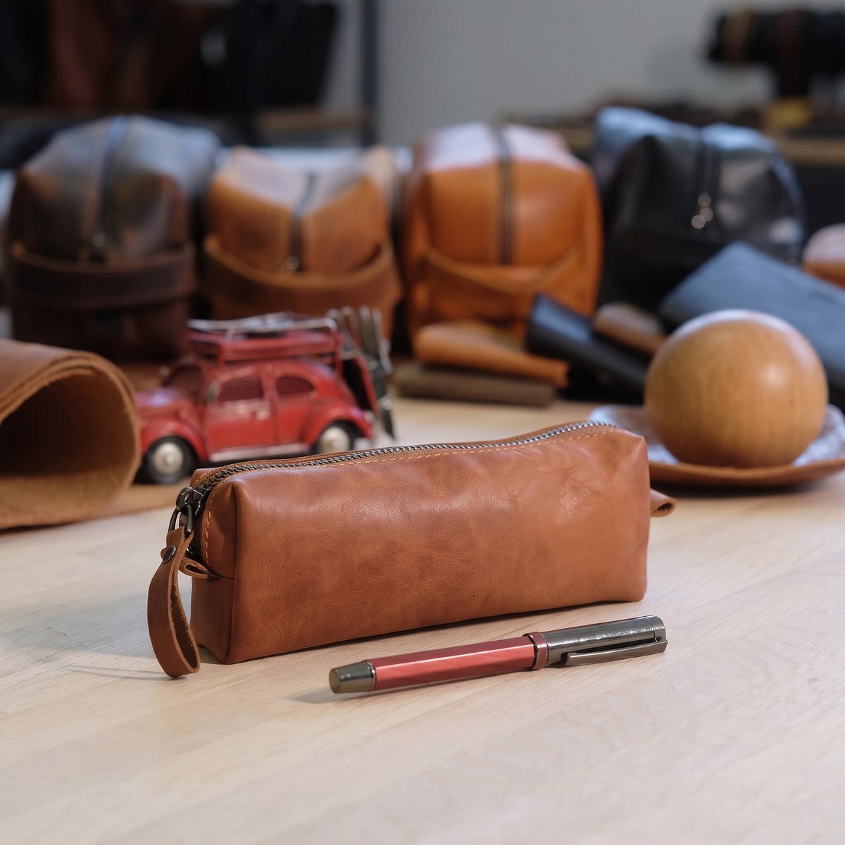 Keane handcrafted leather zippered pen cases in tan and dark brown pull up leather - Yubello
