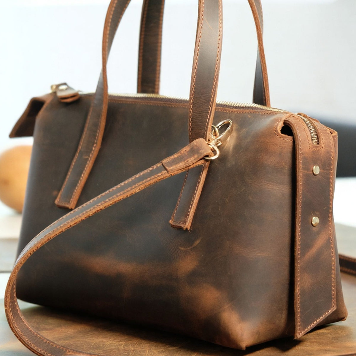 Maelis handcrafted brown Crazy Horse leather satchel bag with crossbody strap - Yubello