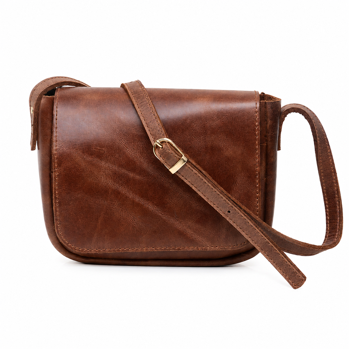 Monteria handcrafted tan brown leather crossbody bag with flap and adjustable strap front view - Yubello