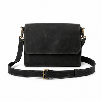 Novan handcrafted black leather compact messenger bag crossbody purse front view - Yubello