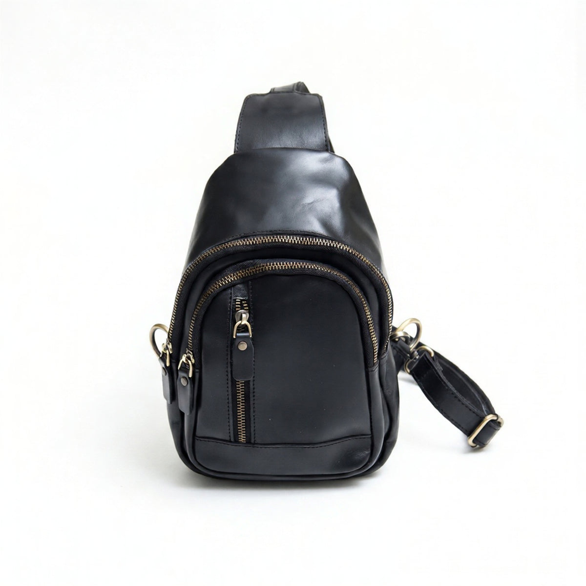 Orvik handcrafted black leather teardrop sling bag multi-zip chest backpack front view - Yubello