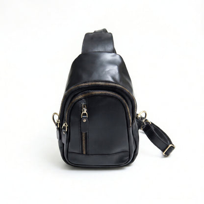 Orvik handcrafted black leather teardrop sling bag multi-zip chest backpack front view - Yubello