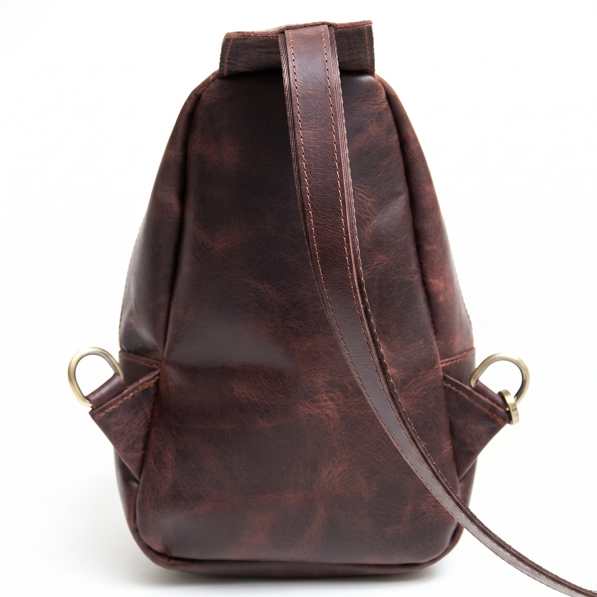 Orvik handcrafted tan brown leather teardrop sling bag multi-zip chest backpack front view - Yubello