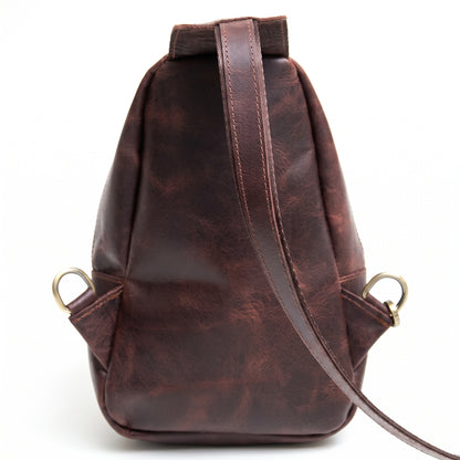 Orvik handcrafted tan brown leather teardrop sling bag multi-zip chest backpack front view - Yubello
