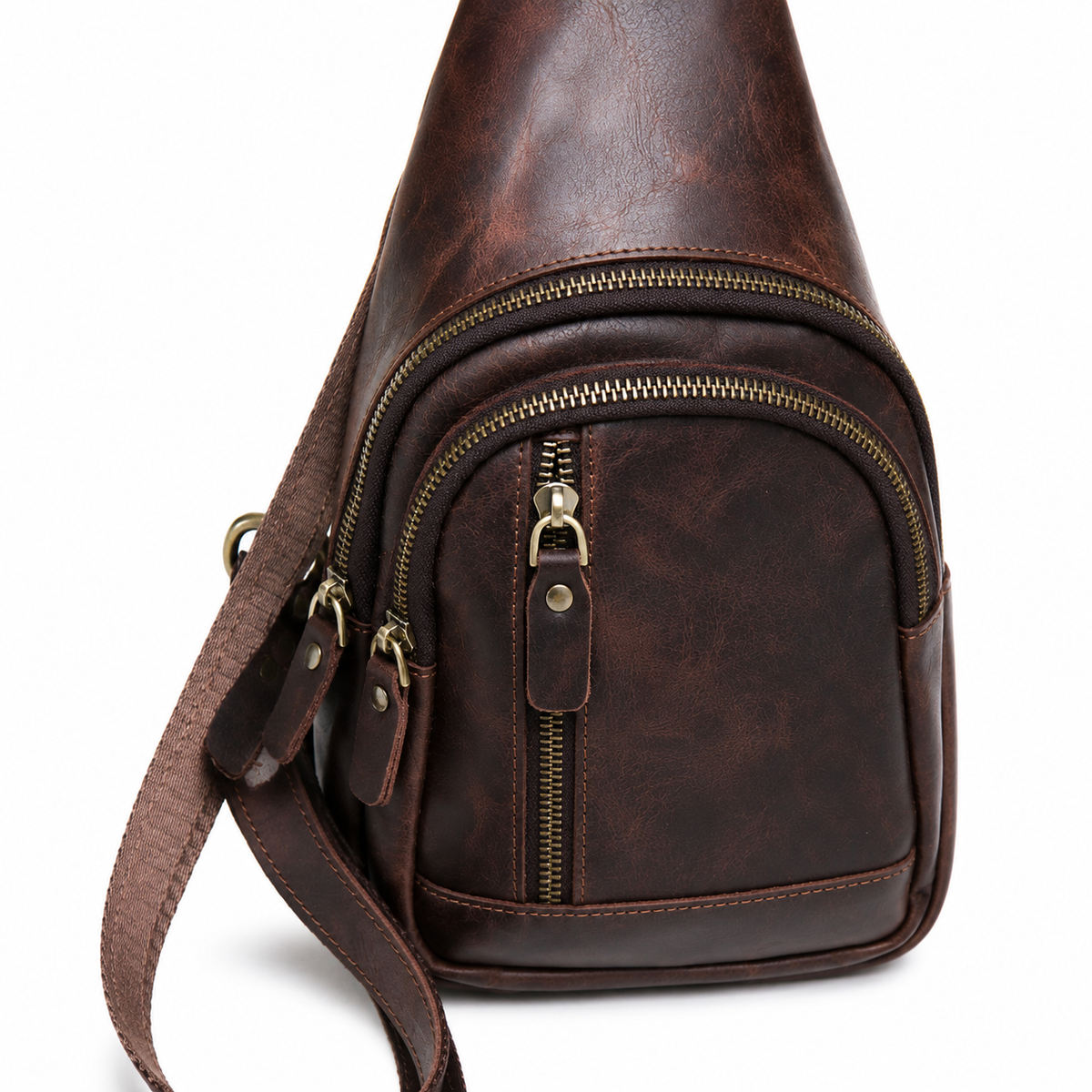 Orvik handcrafted tan brown leather teardrop sling bag multi-zip chest backpack front view - Yubello
