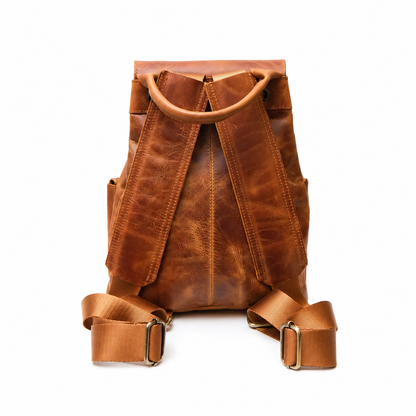 Soline handcrafted brown leather backpack vintage rucksack street style on model - Yubello