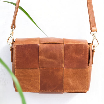 Vetra handcrafted woven brown leather crossbody flap bag front view - Yubello