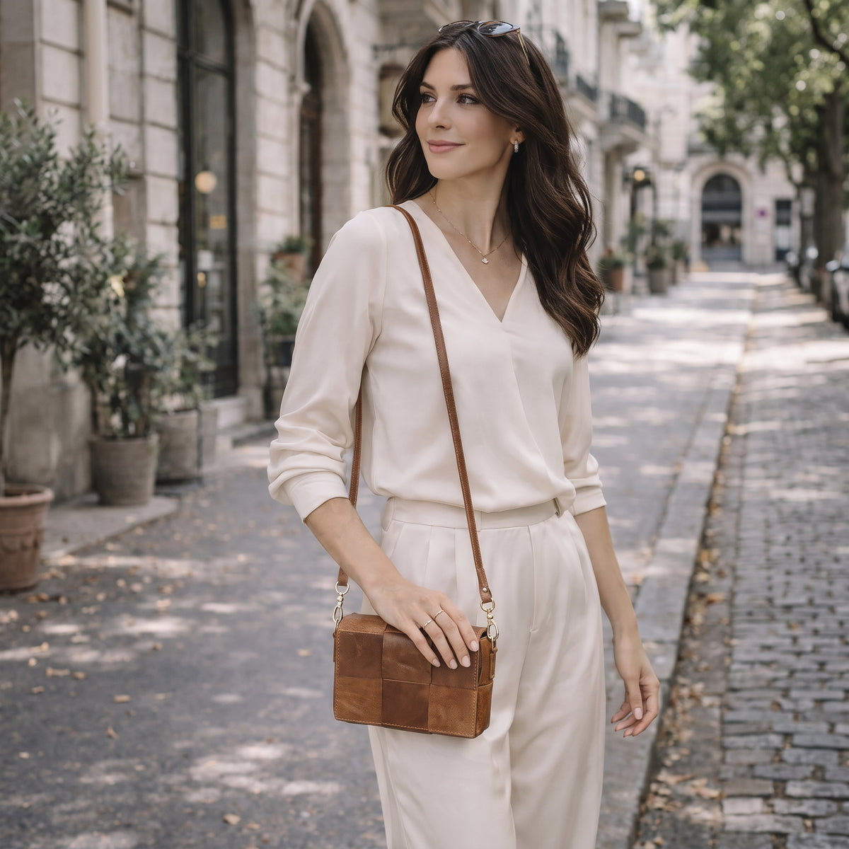 Vetra handcrafted woven brown leather crossbody flap bag front view - Yubello